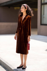 Tailored velvet midi dress with structured lapels and long sleeves for elegant occasions
