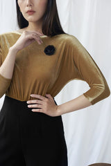 Soft velvet blouse with boat neckline and fitted silhouette for elegant occasion wear