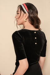 Fitted velvet blouse with pearl button detail and half sleeves for chic evening styling