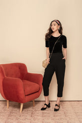 Fitted velvet blouse with pearl button detail and half sleeves for chic evening styling