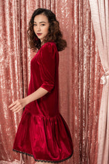 Soft velvet V-neck dress with gathered skirt and three-quarter puff sleeves