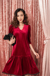 Soft velvet V-neck dress with gathered skirt and three-quarter puff sleeves