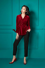 Tailored wrap-front velvet blouse with notched lapels and waist tie for evening elegance