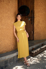 Elegant pleated midi dress crafted from soft silk with cap sleeves and gathered waist