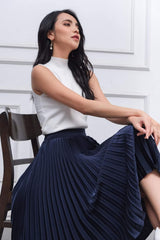 Sleeveless mock neck silk top with ribbed texture and elegant tailored silhouette