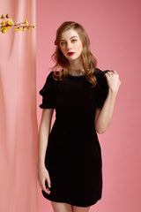 Velvet midi dress with figure-skimming silhouette and side slit for elegant evening styling