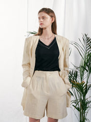 Tailored Linen Blazer with Asymmetric Button Detail and Elongated Silhouette
