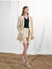 Tailored Linen Blazer with Asymmetric Button Detail and Elongated Silhouette