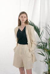 Tailored Linen Blazer with Asymmetric Button Detail and Elongated Silhouette