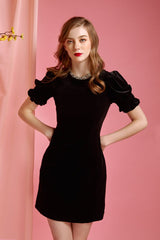 Velvet midi dress with figure-skimming silhouette and side slit for elegant evening styling