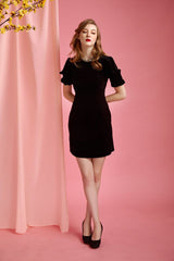 Velvet midi dress with figure-skimming silhouette and side slit for elegant evening styling