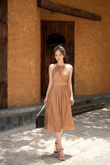 Halter Neck Pleated Silk Dress with Ruched Waist and Flowing Midi Skirt