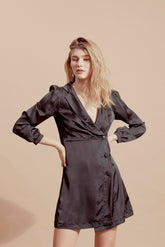Velvet wrap mini dress with puff sleeves and deep V-neckline for elegant evening styling