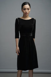 Velvet boat neck midi dress with pearl shoulder detail and tailored waist silhouette