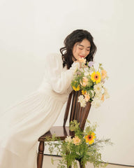 Organza midi dress with wrap-style bodice and billowy sleeves for soft feminine elegance