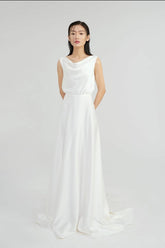 Silk cowl neck sleeveless dress with open back and button detail for elegant occasions