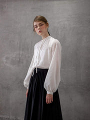 Silk Pleated Midi Skirt with Flowing A-Line Shape and Elegant Movement for Women