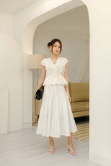 Cotton poplin midi skirt with high waist, paneled construction, and flared silhouette