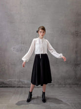 Silk Long Sleeve Blouse with Tie Neck and Billowed Cuffs for Elegant Day-to-Evening Wear