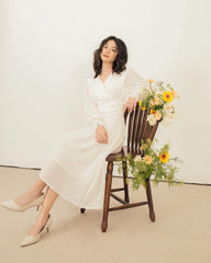 Organza midi dress with wrap-style bodice and billowy sleeves for soft feminine elegance