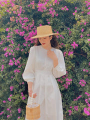 Silk midi dress with puff sleeves and waist tie detail for a classic feminine silhouette