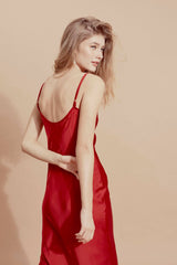 Velvet slip midi dress with cowl neckline and open back for elevated evening and occasion wear