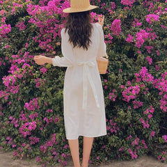 Silk midi dress with puff sleeves and waist tie detail for a classic feminine silhouette