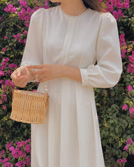 Silk midi dress with puff sleeves and waist tie detail for a classic feminine silhouette