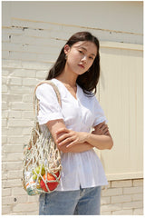 V-Neck Linen Blouse with Puff Sleeves and Peplum Waist Detail