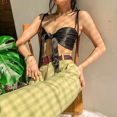 Silk crop top with tie-front design and adjustable shoulder straps for elevated summer looks