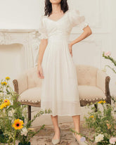 Organza midi dress with ruched sweetheart neckline and puff sleeves for romantic styling