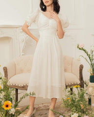 Organza midi dress with ruched sweetheart neckline and puff sleeves for romantic styling