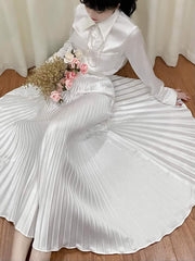 Silk Midi Skirt with High Waist and Knife Pleats for Elegant Flow and Feminine Movement