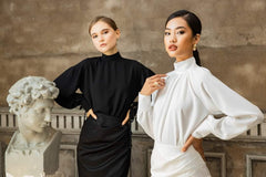 Draped silk midi skirt with ruched side detail and high slit for refined elegance