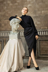 Draped silk midi skirt with ruched side detail and high slit for refined elegance