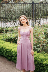 Silk midi dress with ruched bodice, wide straps, and flared skirt for elegant movement