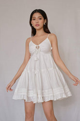 Lightweight organza mini dress with ruffle trim and adjustable tie shoulder straps