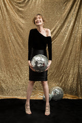 Velvet pencil skirt with tailored silhouette and satin contrast for elevated evening dressing