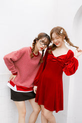 Velvet mini dress with sweetheart neckline and puff sleeves for elegant evening styling