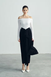 Off-shoulder fitted top with long sleeves and minimalist neckline for modern sophistication