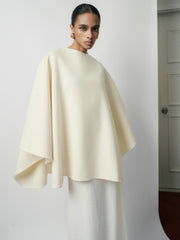 Flowing Blend Cape with Sculptural Drape and Structured Back Zipper Detail