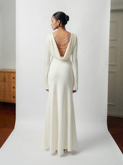 Backless Draped Evening Dress with Pearl Chain Detail and Flared Hem Silhouette