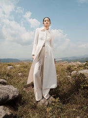 Textured wool blend double-breasted long coat with structured tailoring