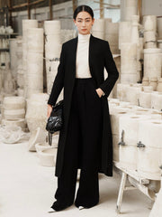 Tailored wool blend long coat with structured silhouette and minimalist open-front design