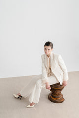 Tailored Notch Lapel Blazer With Sharp Shoulders And Flap Pockets For Formal Styling