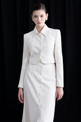 Structured bouclé midi skirt with front slit and fabric-covered buttons