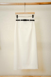 High-waisted midi pencil skirt with contrast waistband and elegant tailored silhouette