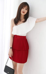 Silk mini skirt with double-layer pleated design and high-waisted tailored fit