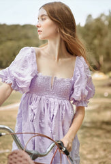 Silk mini dress with puff sleeves and ruched bodice for elegant summer and resort styling