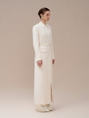 Manteau long structuré en laine mélangée avec col tailleur, ourlet fendu et poche à rabat